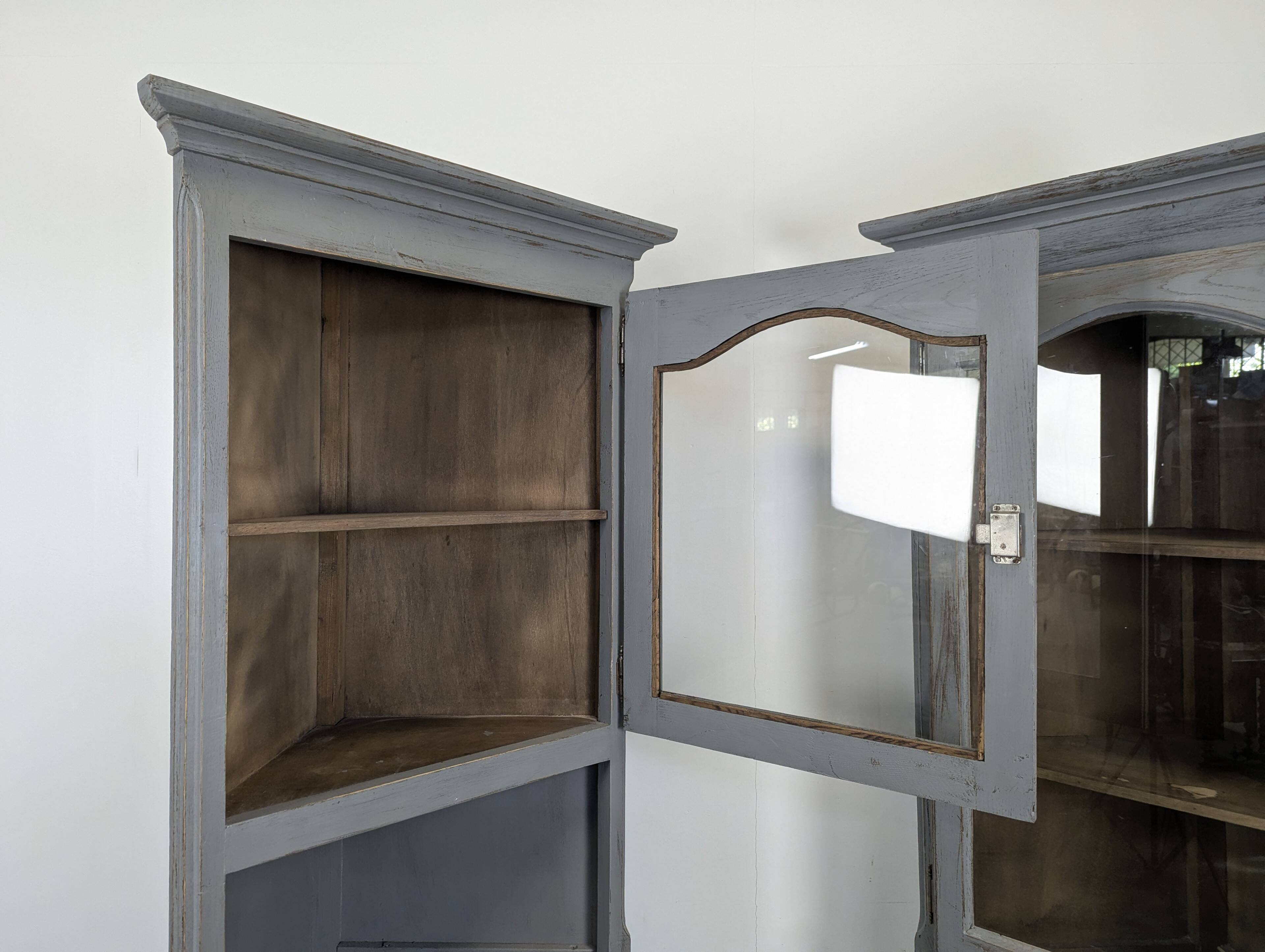 Pair of re-edged corner cabinets