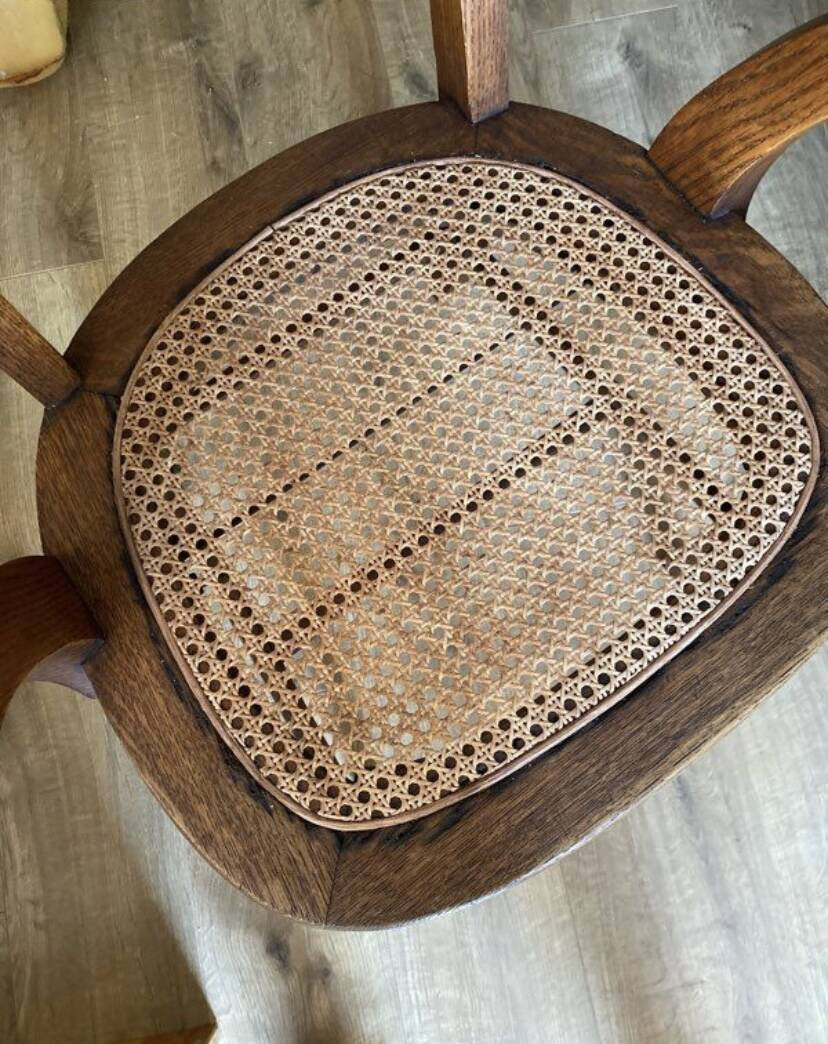 Solid oak and cane armchair