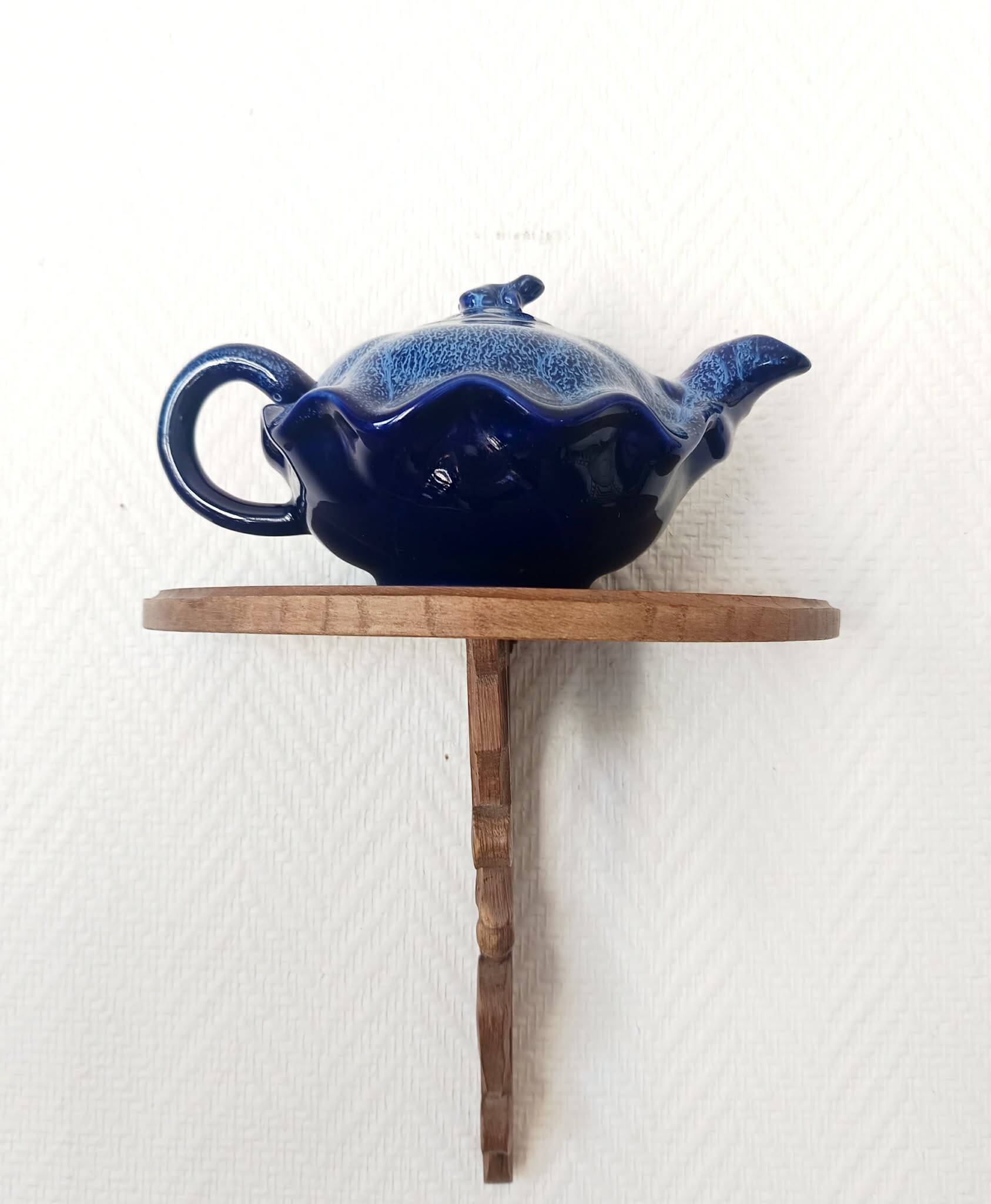 Blue ceramic Art Deco teapot with a frog.