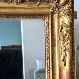 Miroir ancien à moulures dorées