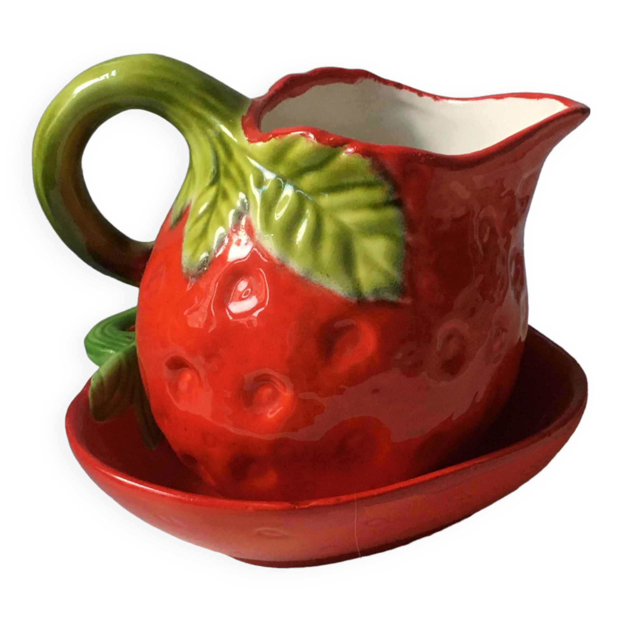 Strawberry-shaped pitcher with a dish