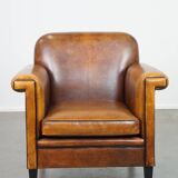 Sheep leather Art Deco design armchair finished with black piping