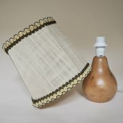 Turned wooden lamp with linen shade