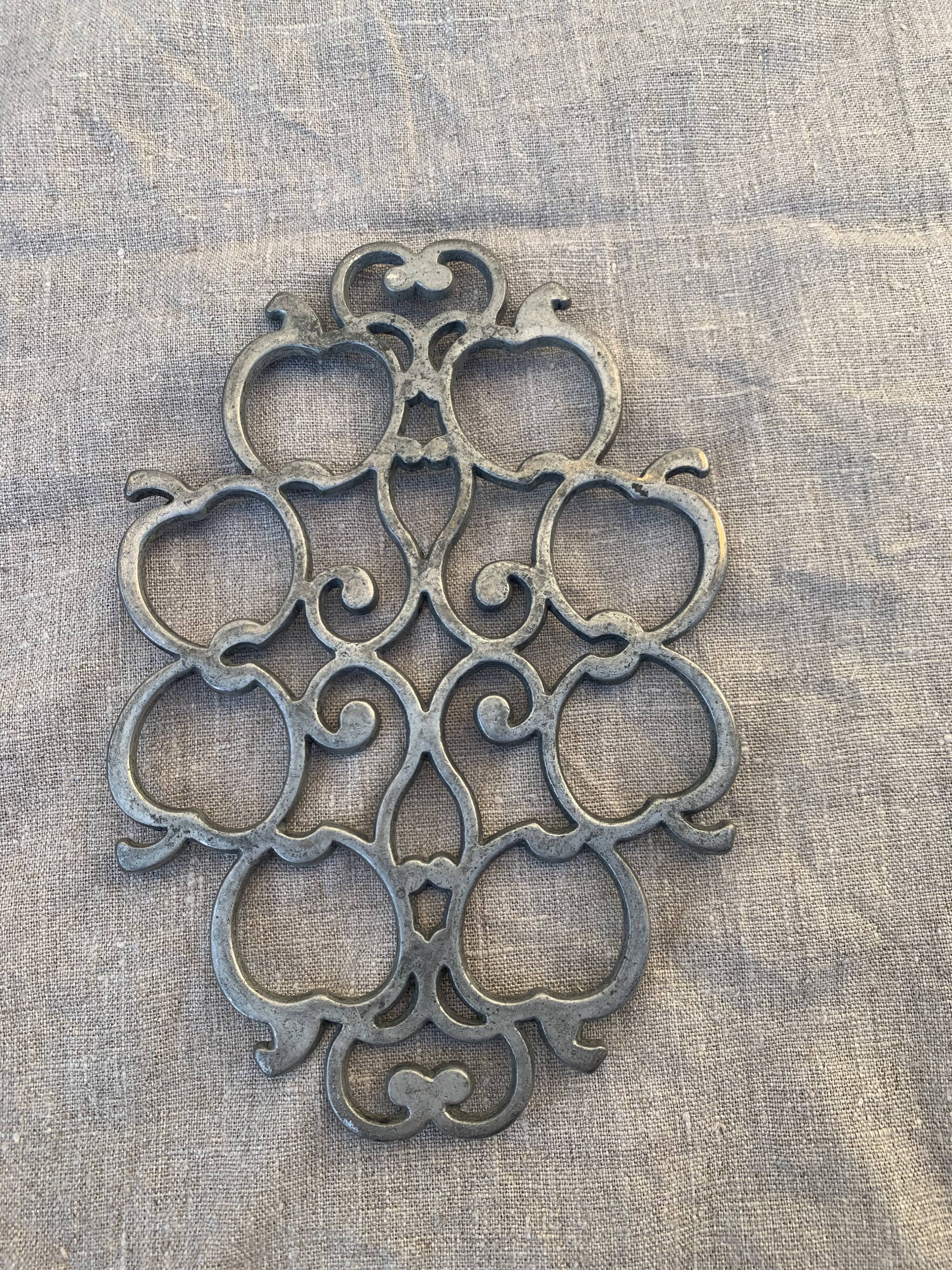 Pewter trivet, vintage apples model