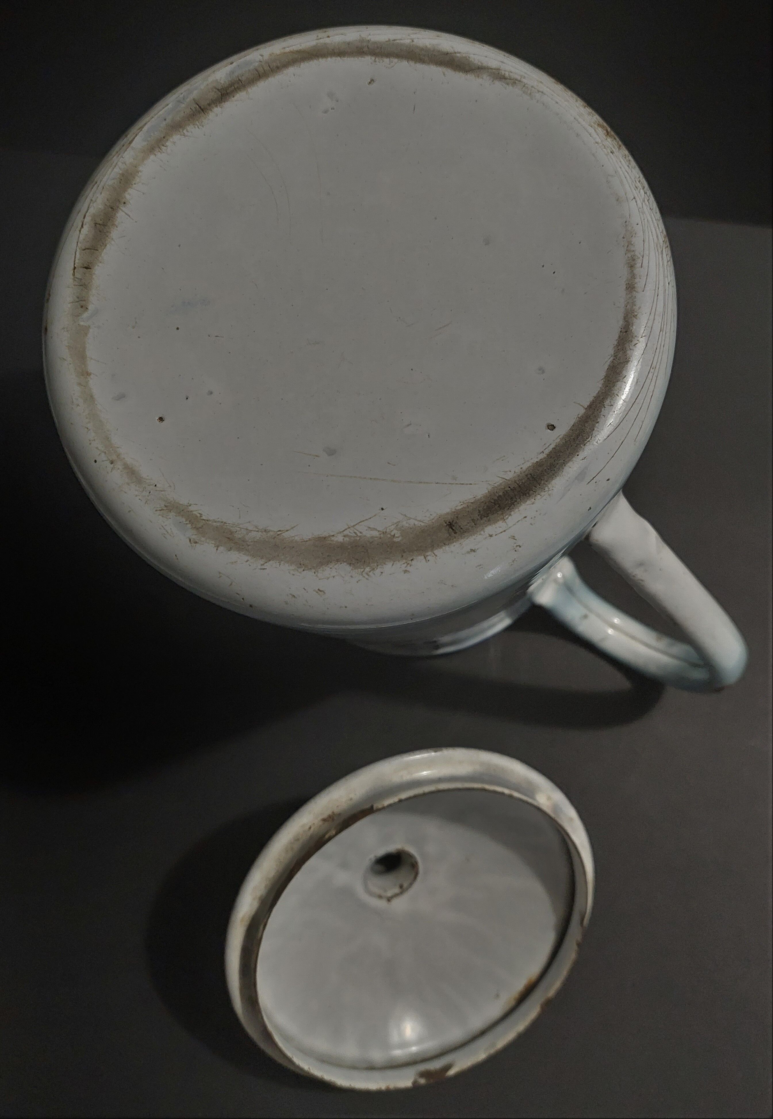 Enamelled sheet metal pourer decorated with black berries early twentieth century