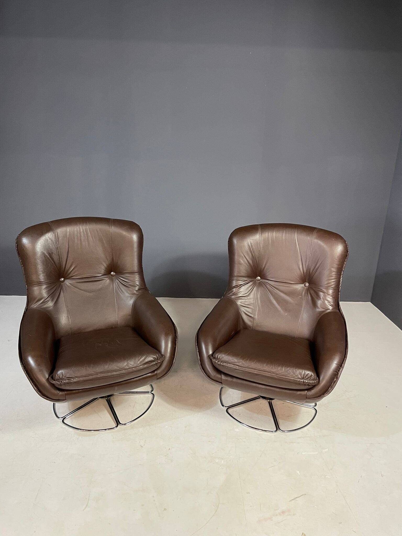 Pair of leather swivel armchairs by PEEM, Finland, 1970s