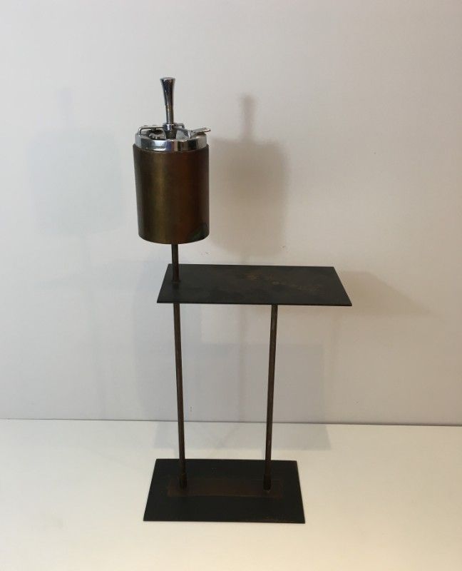 Modernist ashtray in black lacquered metal and brass