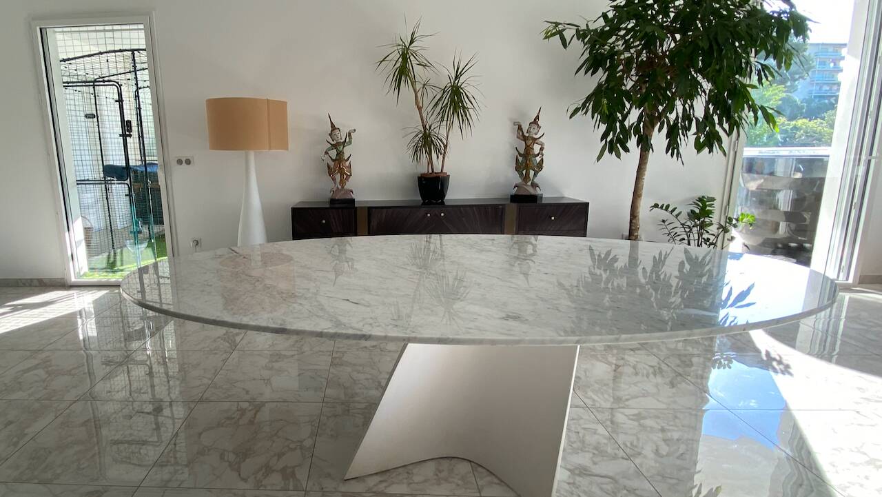 Elliptical table in Carrara marble and Corian attributed to Xavier Lust.
