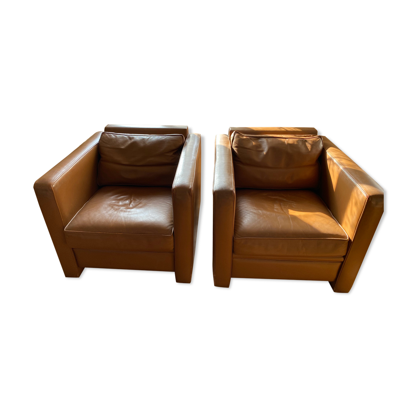 Hugues Chevalier leather armchairs