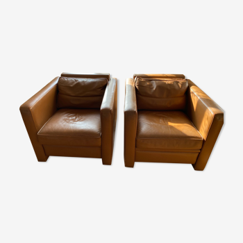 Hugues Chevalier leather armchairs