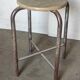 Old vintage metal and wood industrial workshop stool