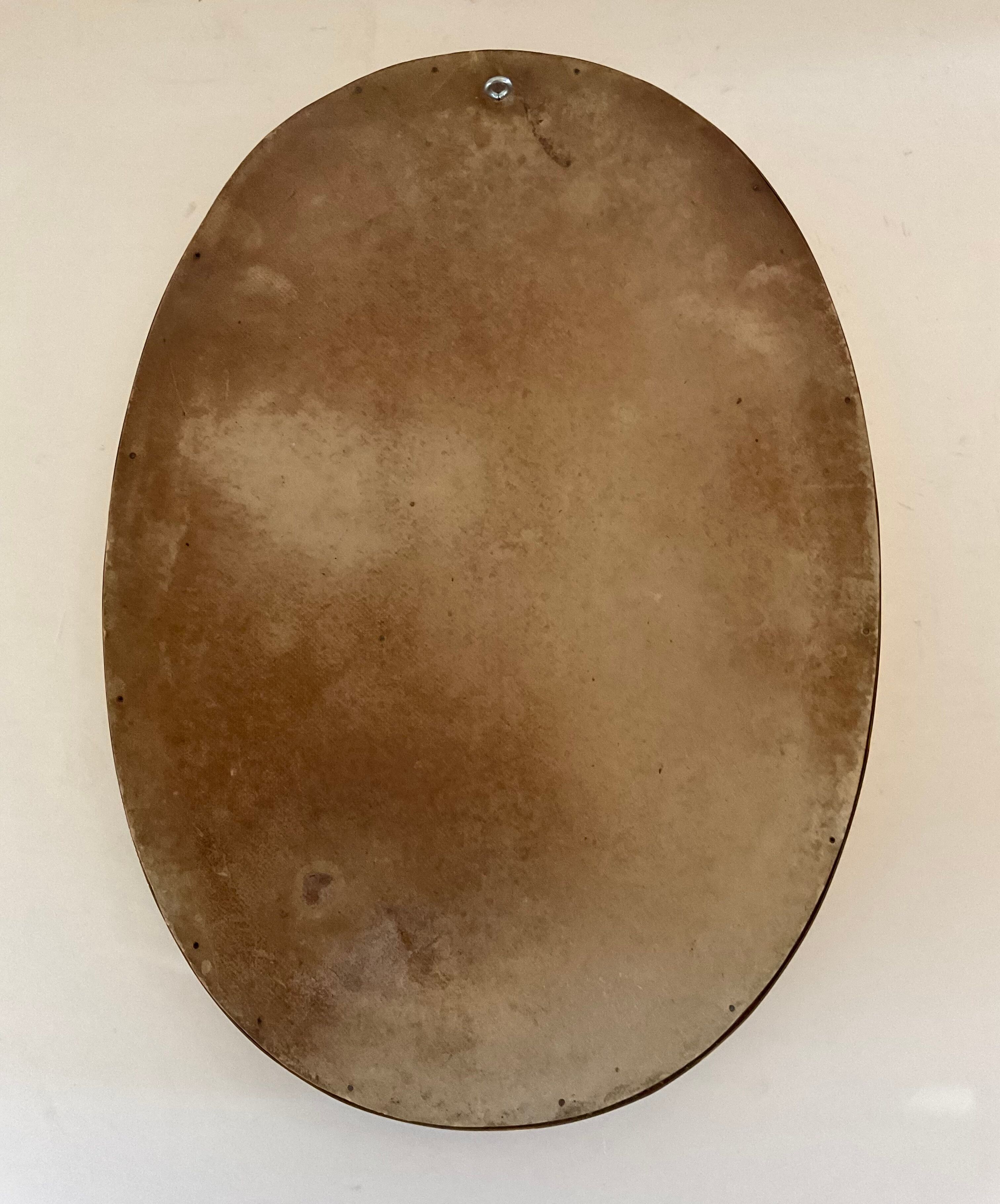 Vintage oval ceramic mirror
