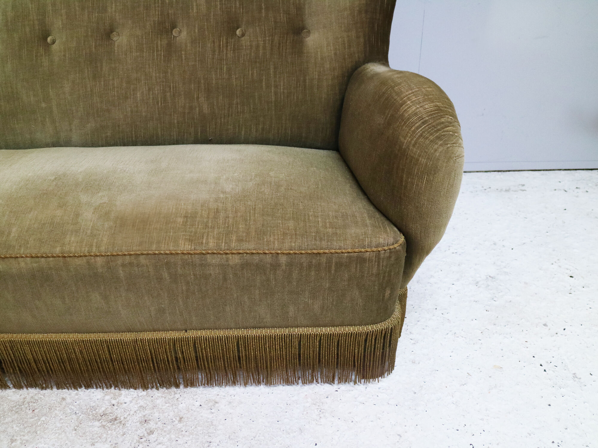 1930’s Danish sofa in green velour with fringed bottom