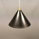 Cone pendant produced by Danish Lyfa in beautiful black lacquer with perforated shade and brass top.