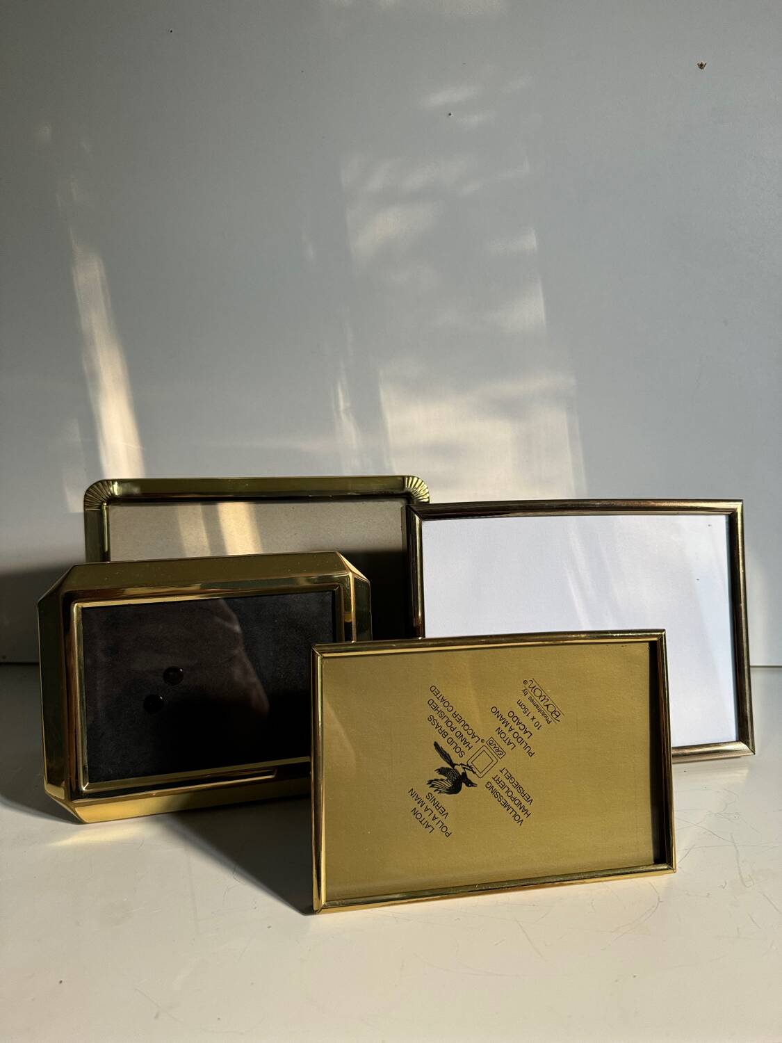 Set of 4 antique brass frames