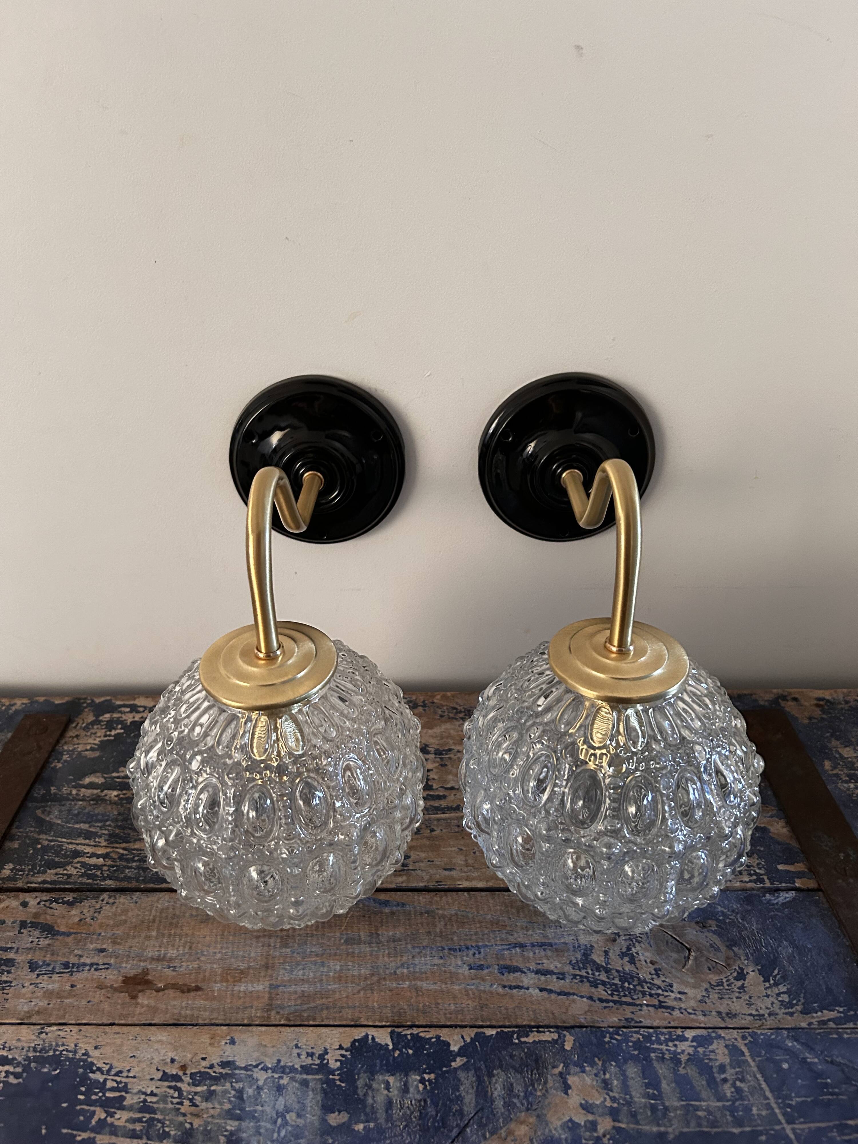 Pair of globe wall lights