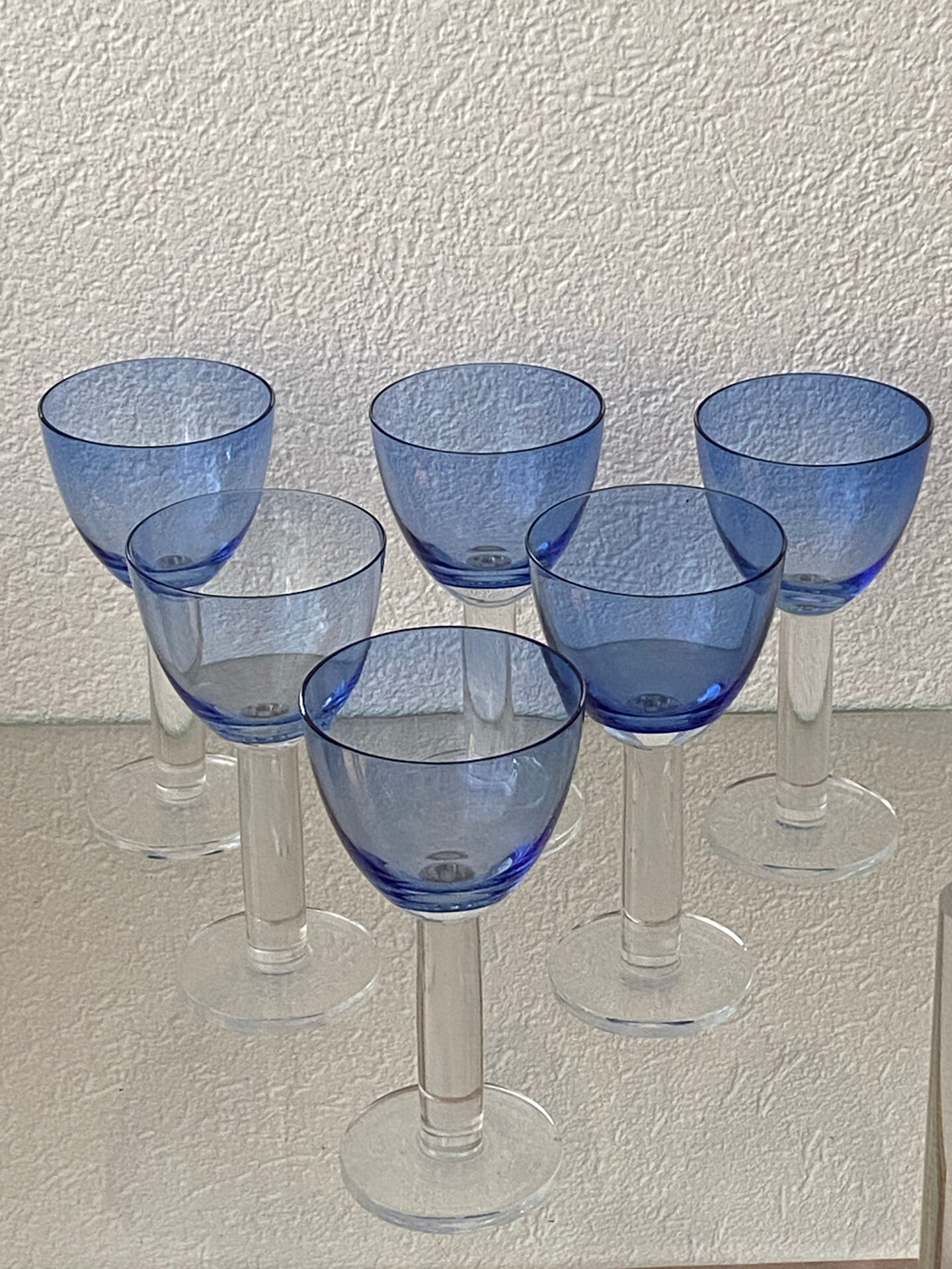 Six two-coloured wine or cocktail glasses.