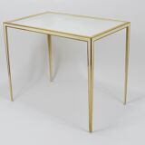 A pair of brass and white mirror tables from Vereinigte Werkstätten, Germany, 1970s.