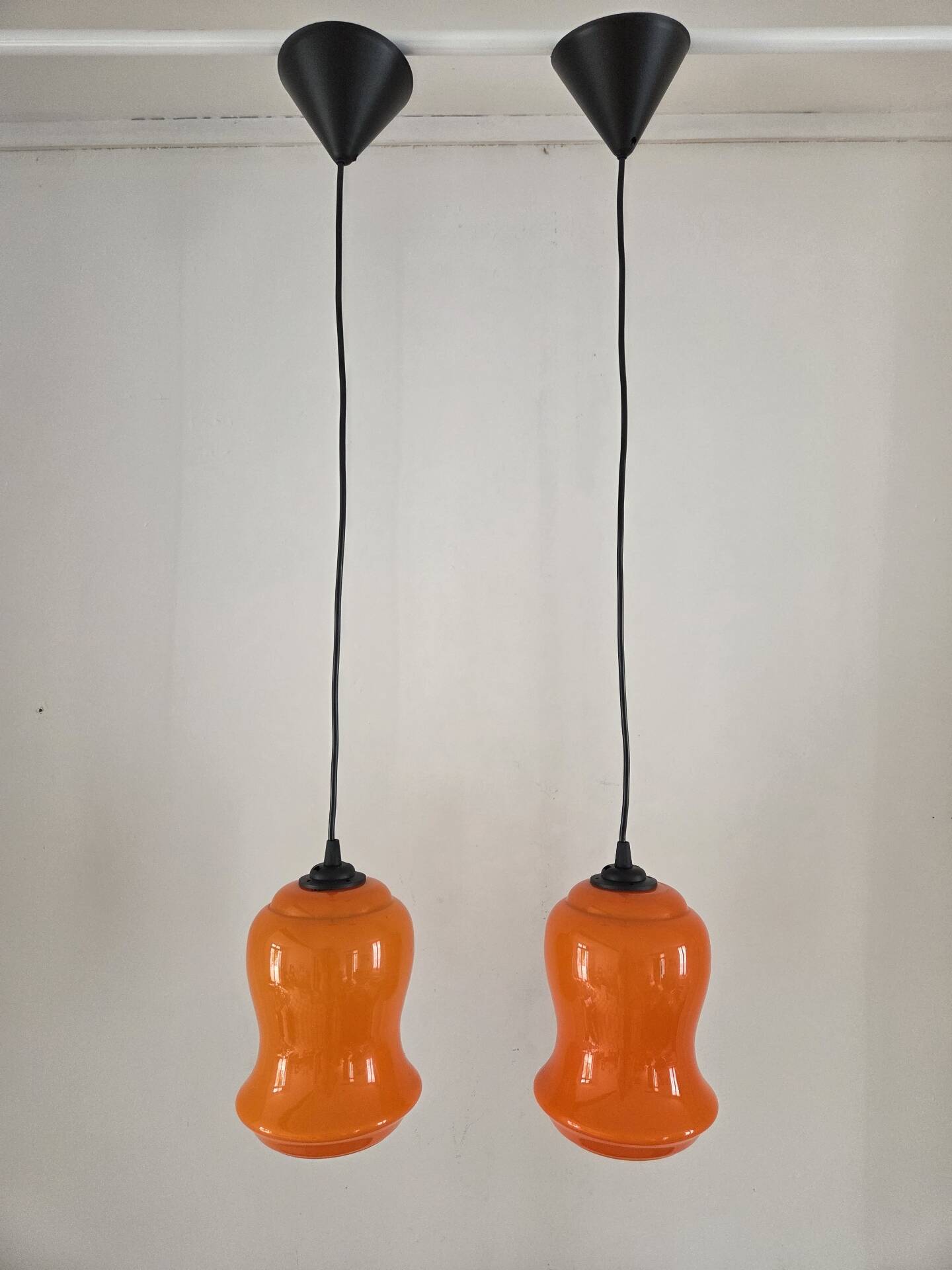 Pair of orange Opaline pendant lights, 1970s