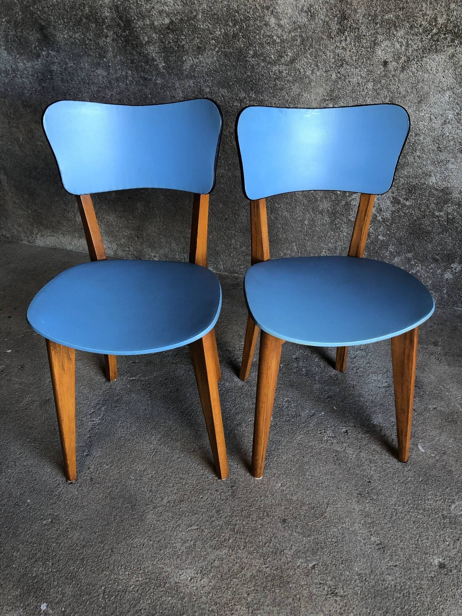 Pair of vintage bistro chairs in wood and light blue vinyl