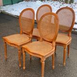 4 caned Louis XVI medallion dining chairs from the 19th century.