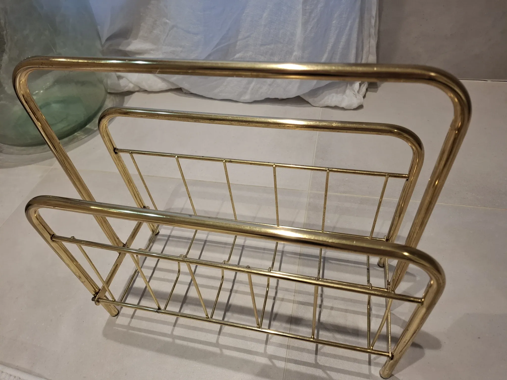Golden metal magazine rack