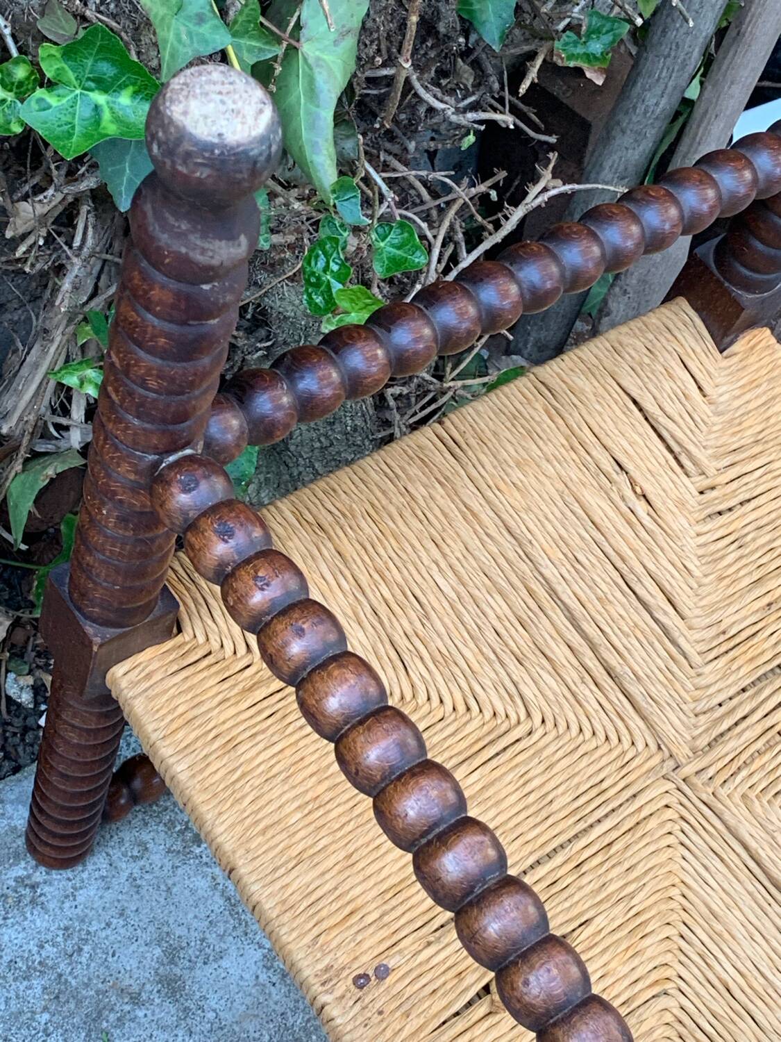 1920s turned wood straw corner chair