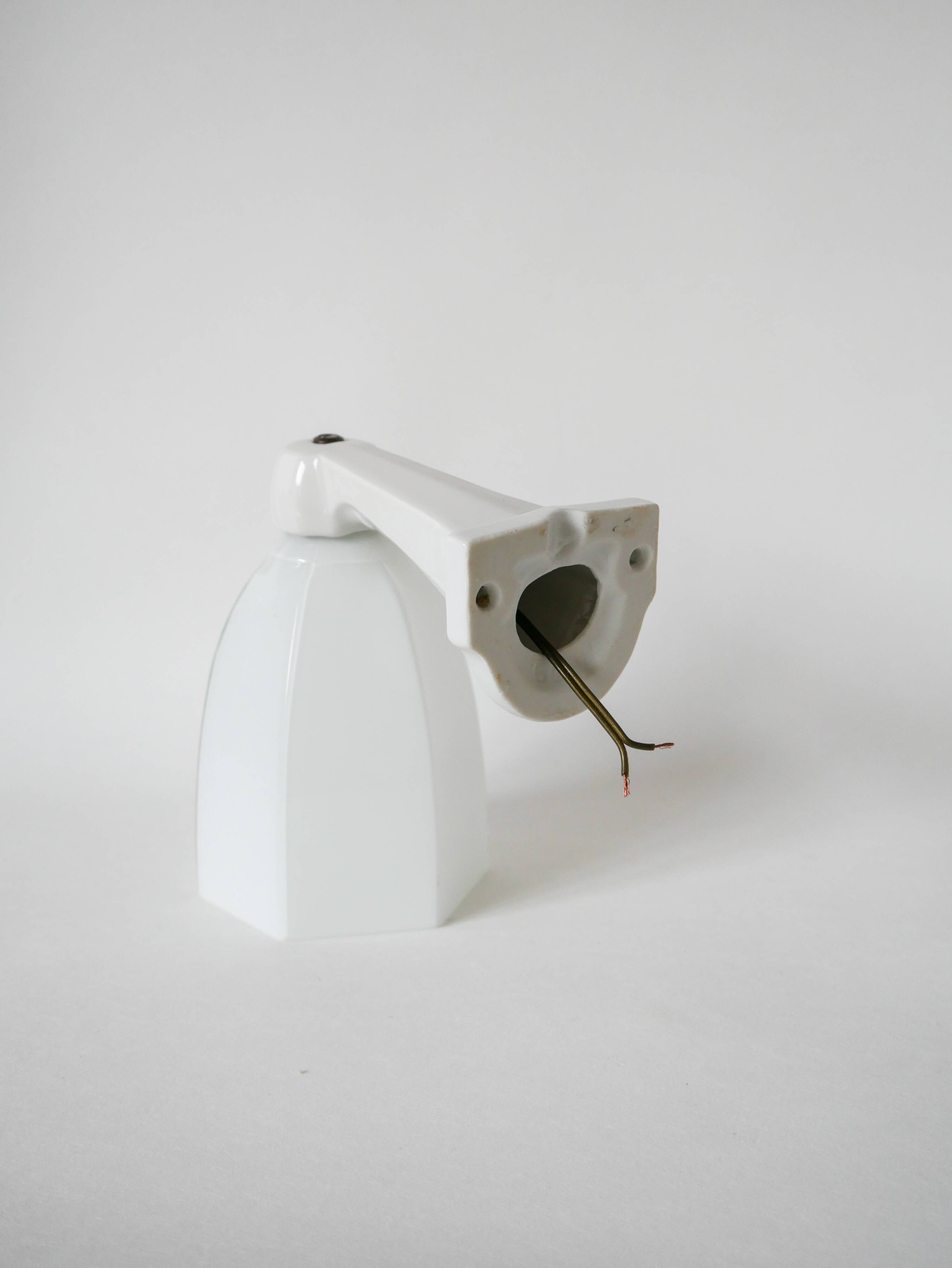 graphic art deco wall light and 20th century porcelain support