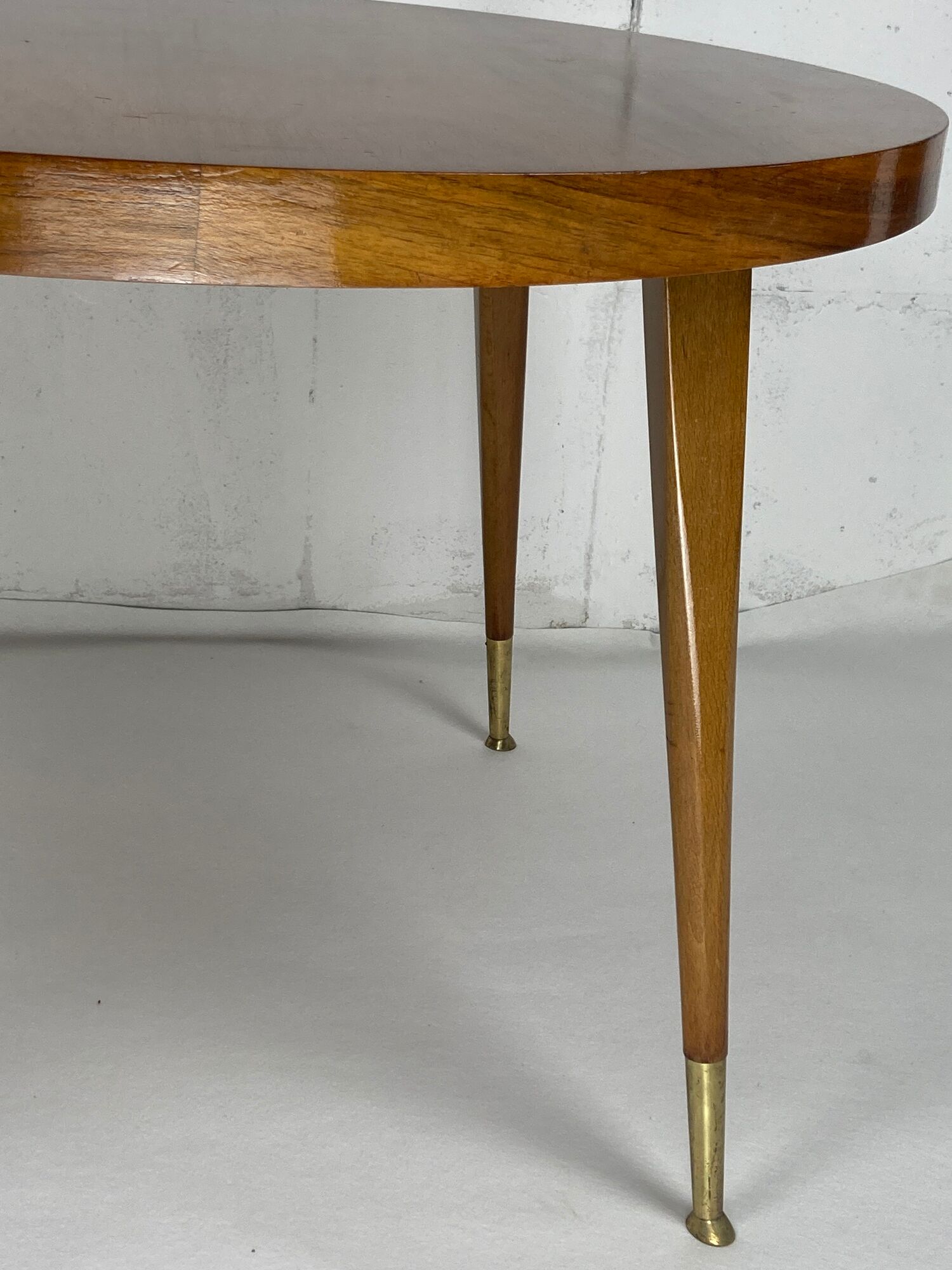 Italian round table with tapered brass leg ends, 1950s