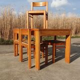 Set vintage pine dining table with 4 rush seat chairs Dutch design