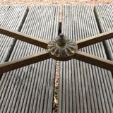 Table basse en bronze et laiton plateau miroir oxydé