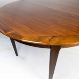 Dining table in rosewood with two extension plates, of danish design from the 1960s.