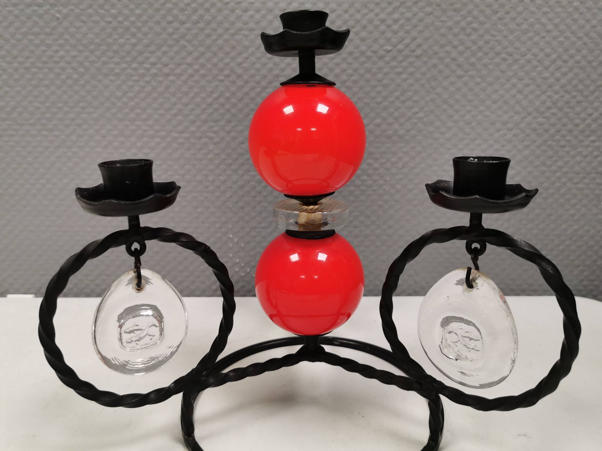 Wrought iron candle holder for 4 candles. by Erik Höglund in the 1960s