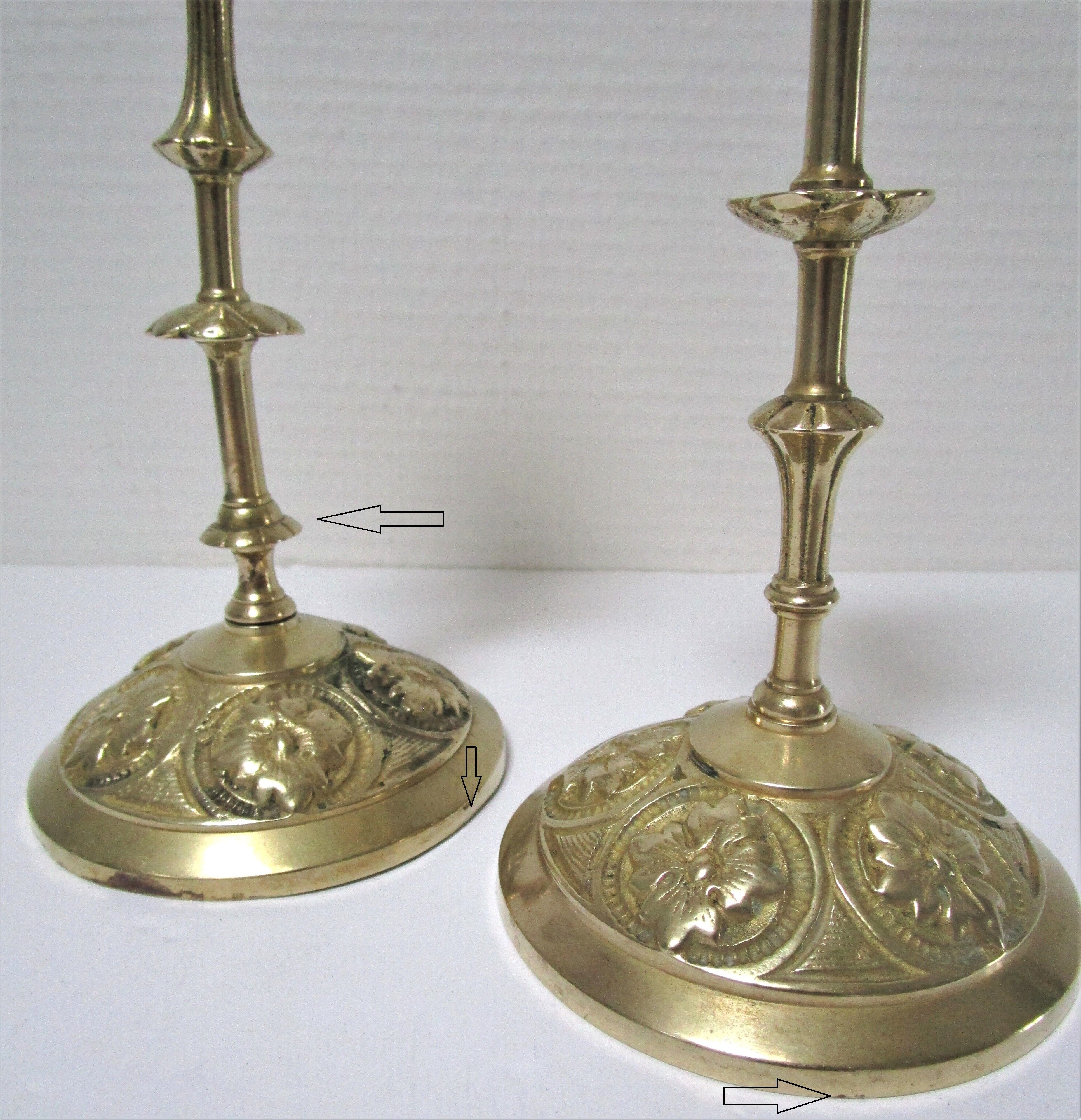 Pair of vintage brass candlesticks decorated with flowers