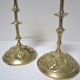 Pair of vintage brass candlesticks decorated with flowers