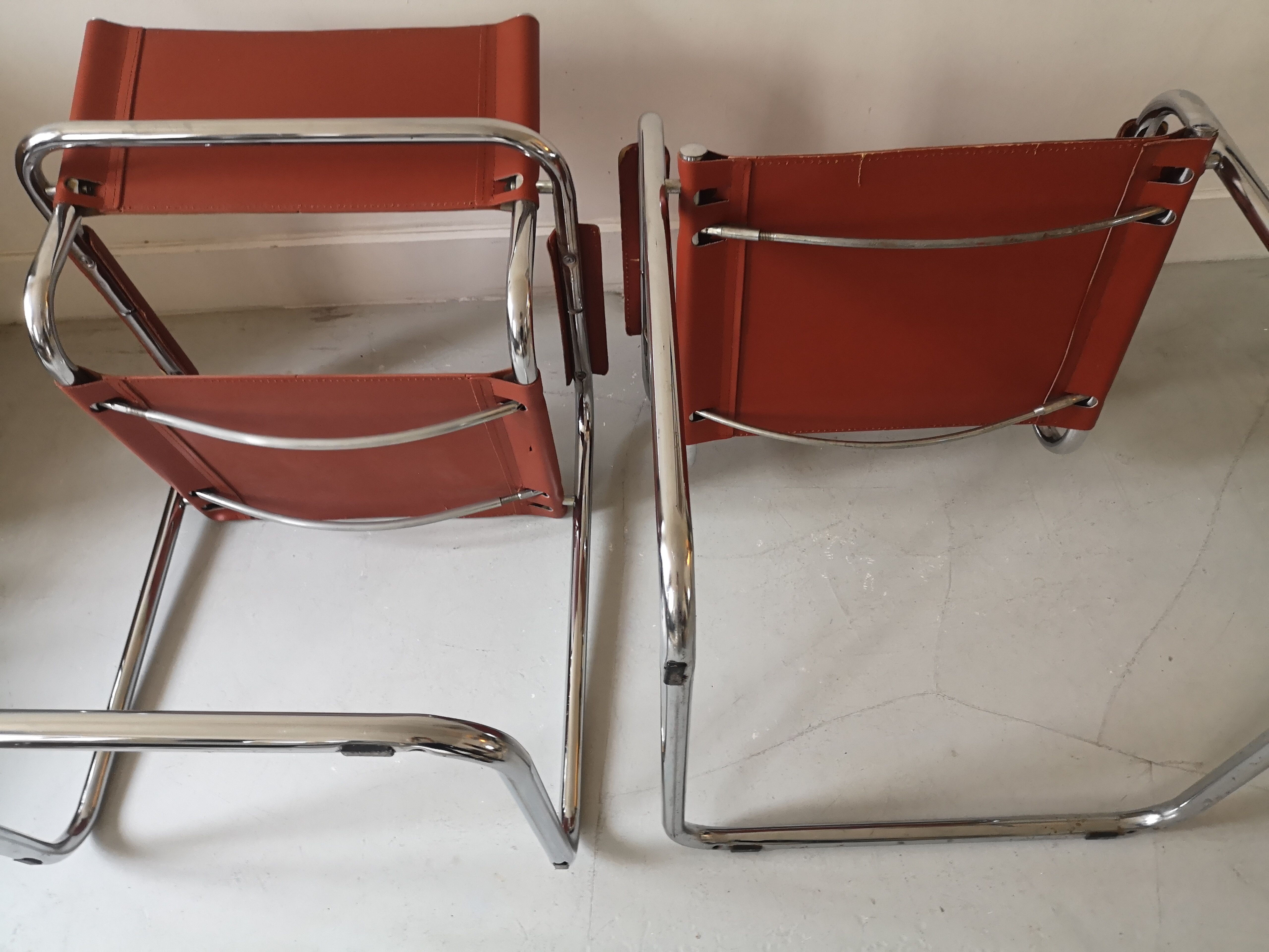 pair of tibular chairs design metal and leather, 1970