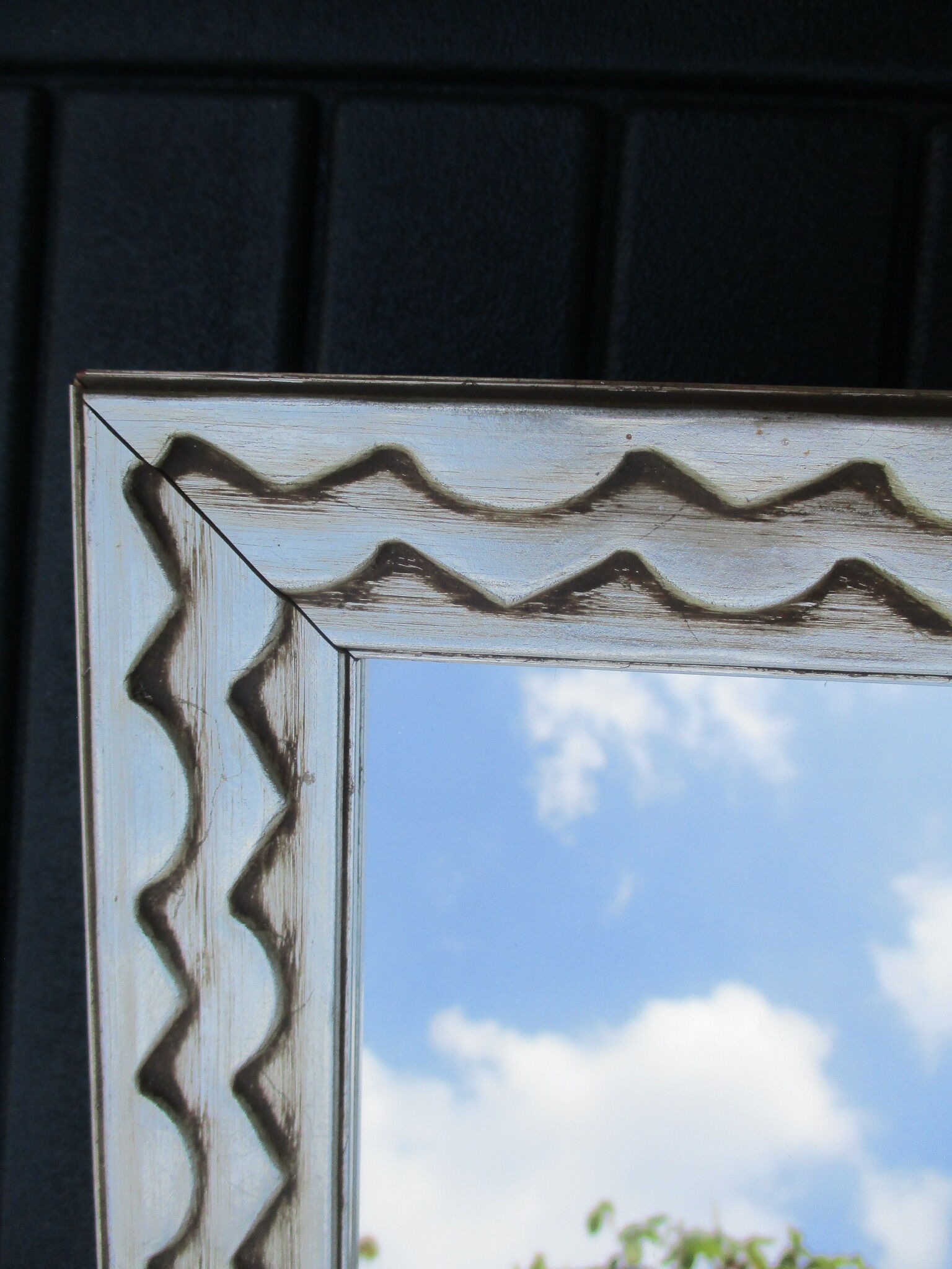 Mirror framing silver carved wood