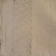 Pair of large thread sheets with handmade lace between two.