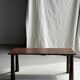 Table basse en teck brun de seconde main indonésienne pieds coniques H37 L8