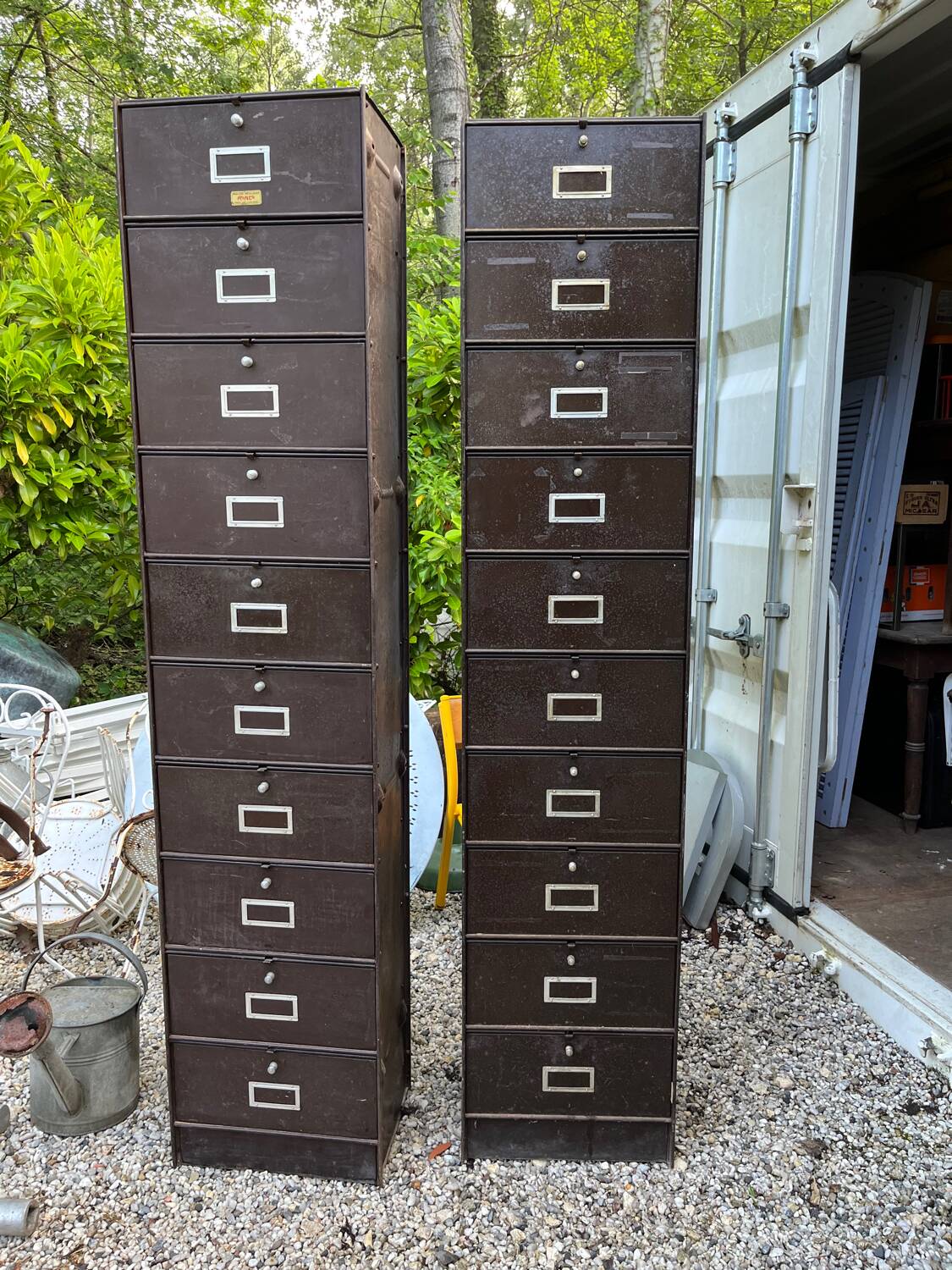 Duo of metal lockers with flaps