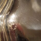 Four silver metal bottle bottoms