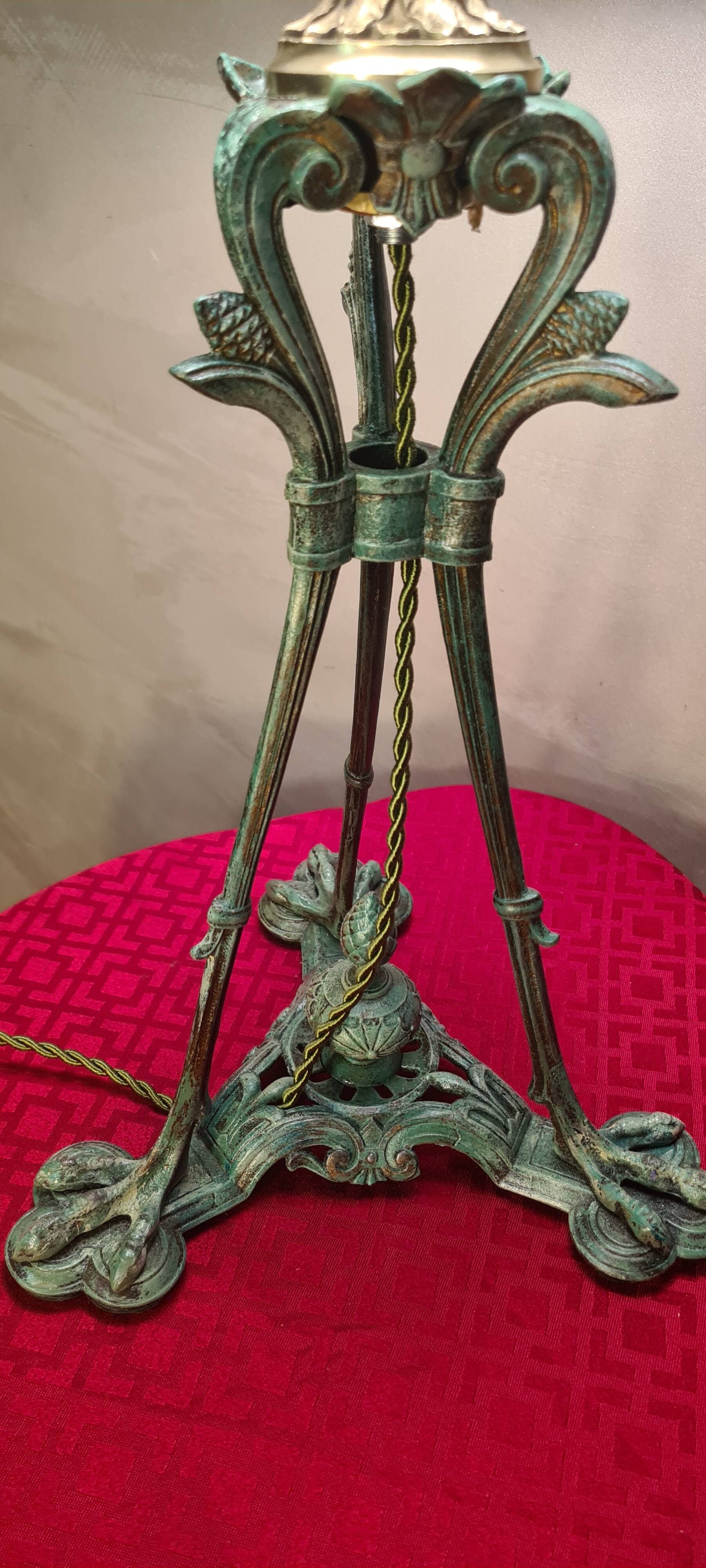 Antique patinated bronze regulator lamp with Tiffany glass shade in very good condition