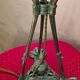 Antique patinated bronze regulator lamp with Tiffany glass shade in very good condition