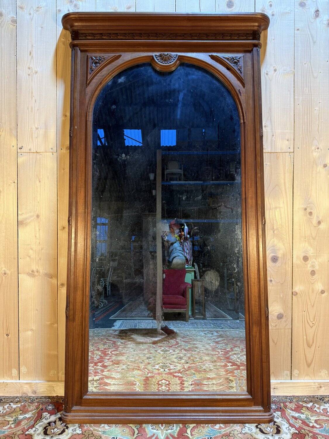 Large walnut mirror from the Art Deco period.