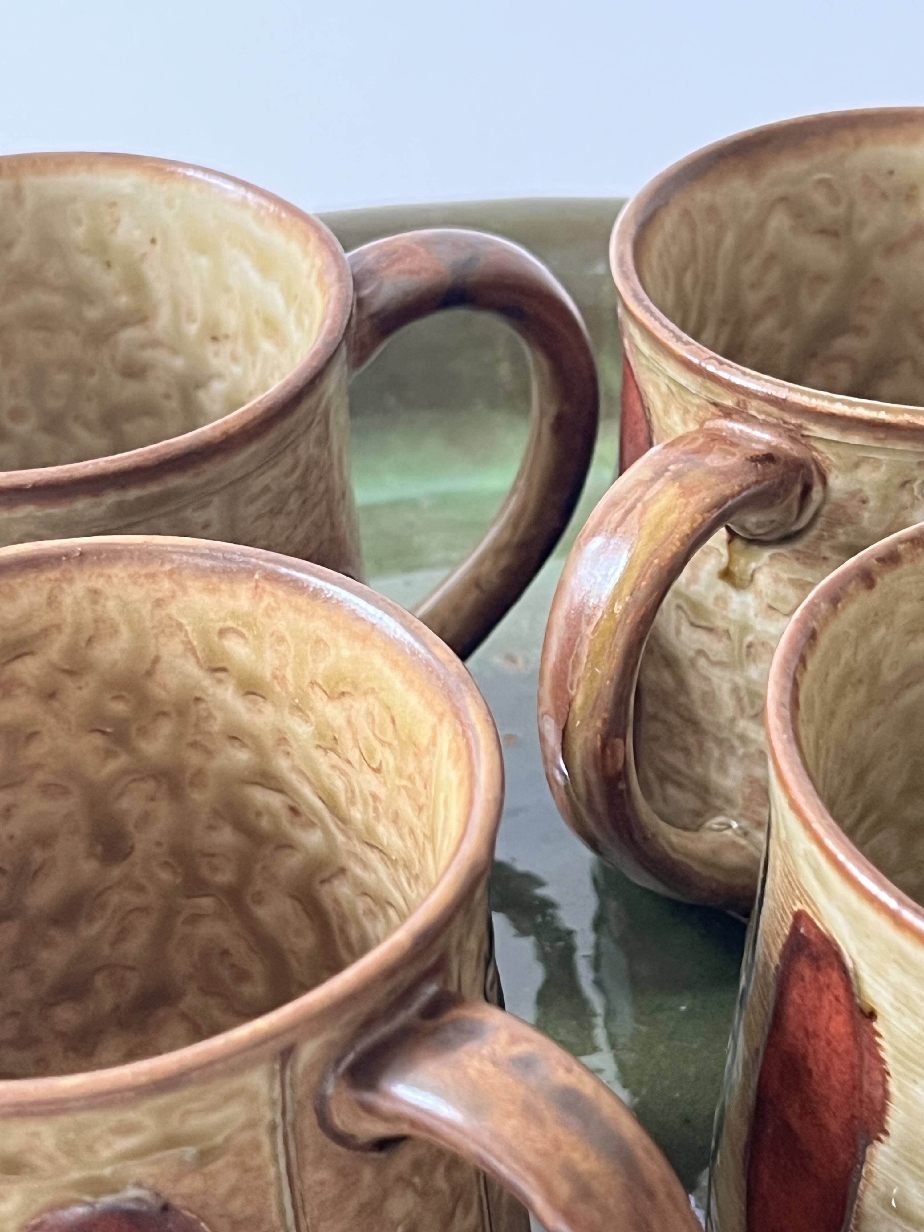 Set of 4 glazed ceramic coffee cups, circa 1970