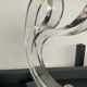 Pair of Hollywood Regency candlesticks in lucite and brass