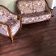 Lot of vintage sofa and armchair with floral patterns.