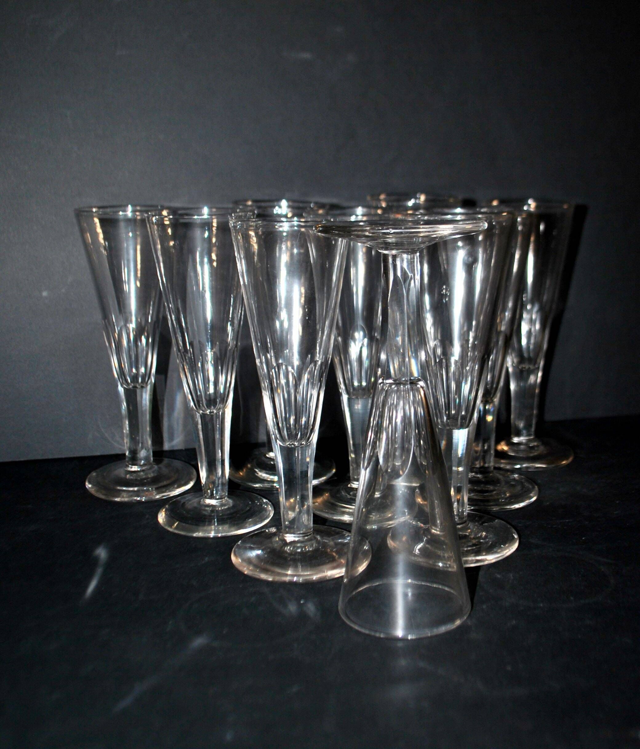 Portieux? Meisenthal? Set of 10 cut glass champagne flutes with flat sides from 1900.