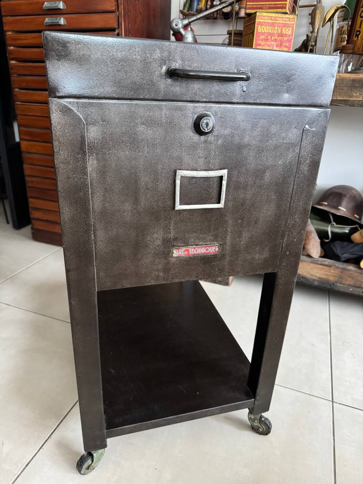 Vintage industrial filing cabinet on wheels