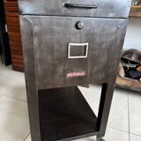 Old vintage industrial filing cabinet on wheels
